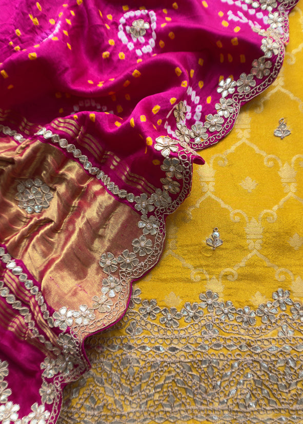 Rangreza Bandhani Yellow and Rani Pink Handloom Gajji Silk Suit with Weaving and Gotta Patti Handwork