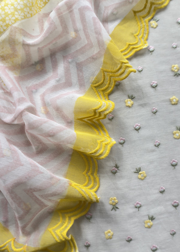 Grey With Yellow Embroidered Unstitched Mulmul Suit With Scalloped Border.