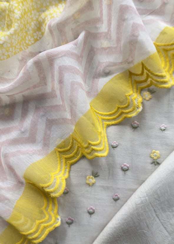Grey With Yellow Embroidered Unstitched Mulmul Suit With Scalloped Border.