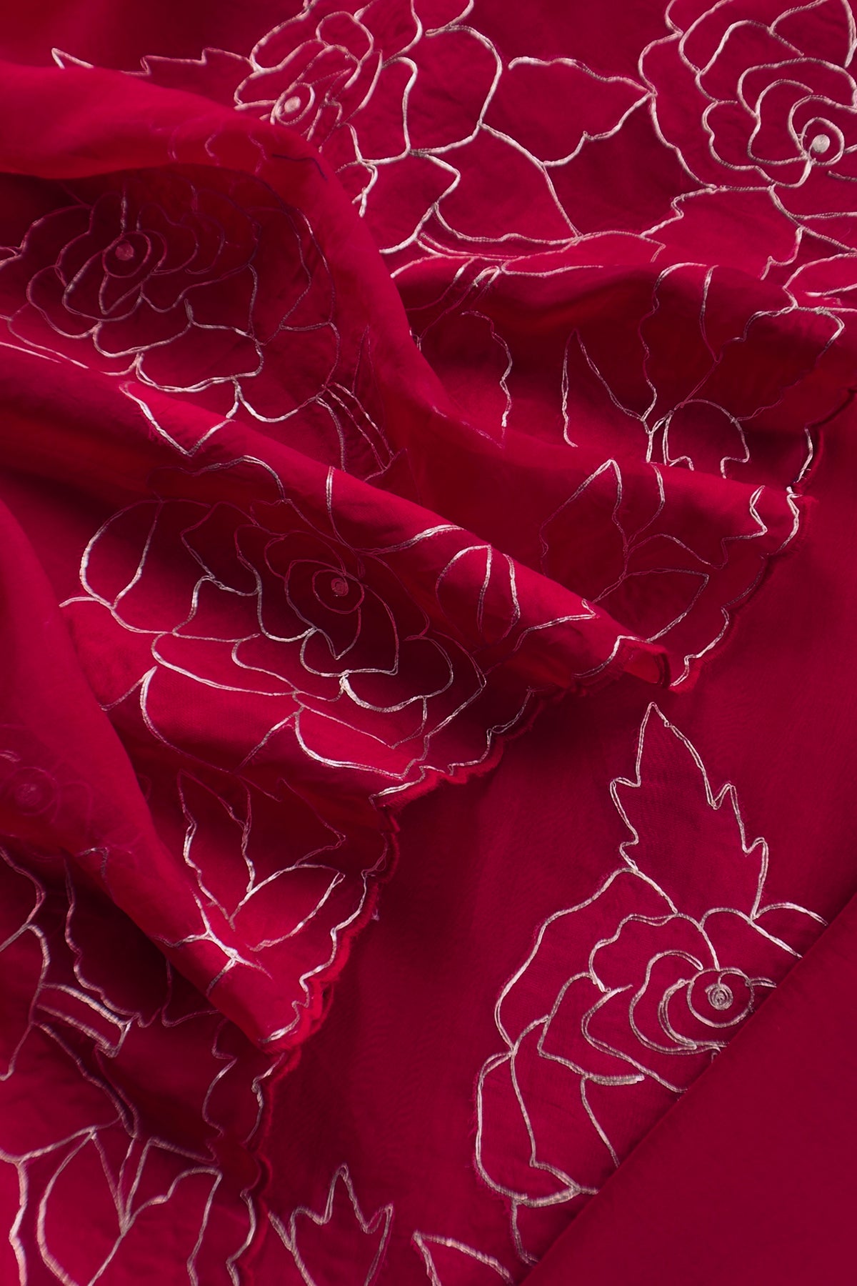 Handloom organza suit with applique and pitta work