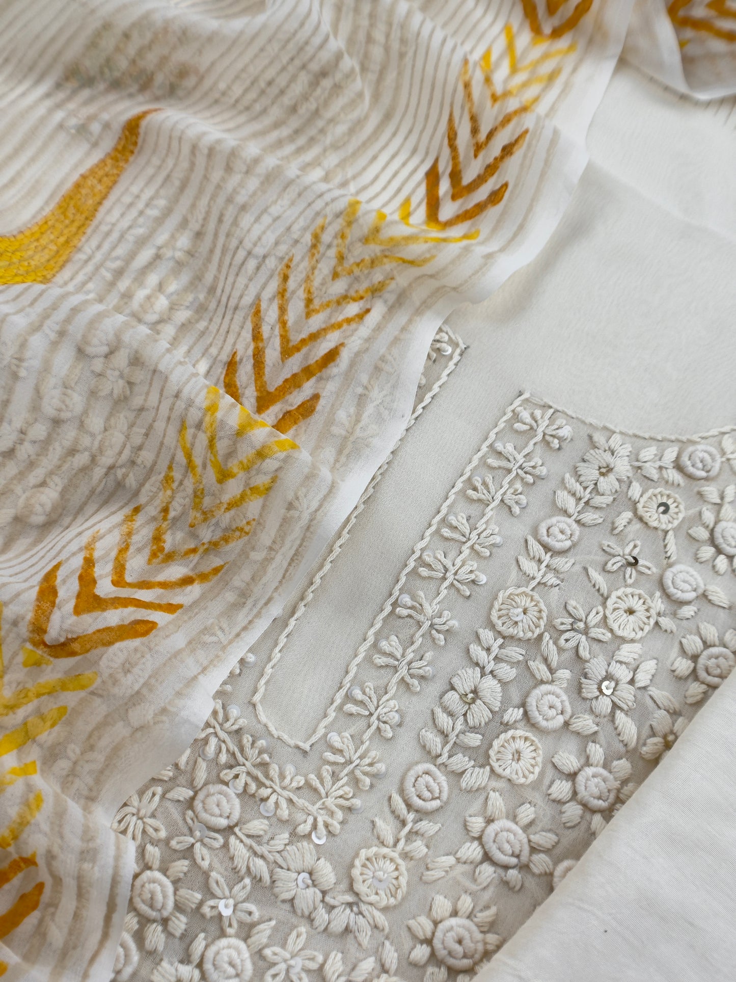 White With Yellow Handloom Georgette Suit With Thread Embroidery