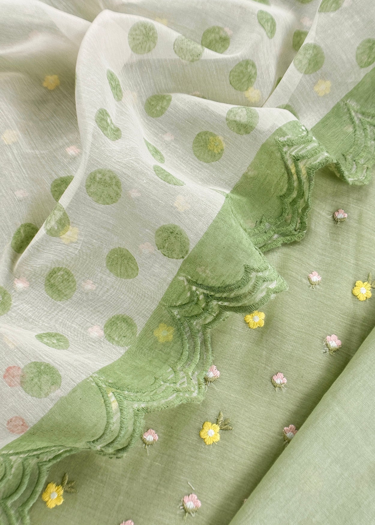 Green Embroidered Unstitched Mulmul Suit With Scalloped Border.