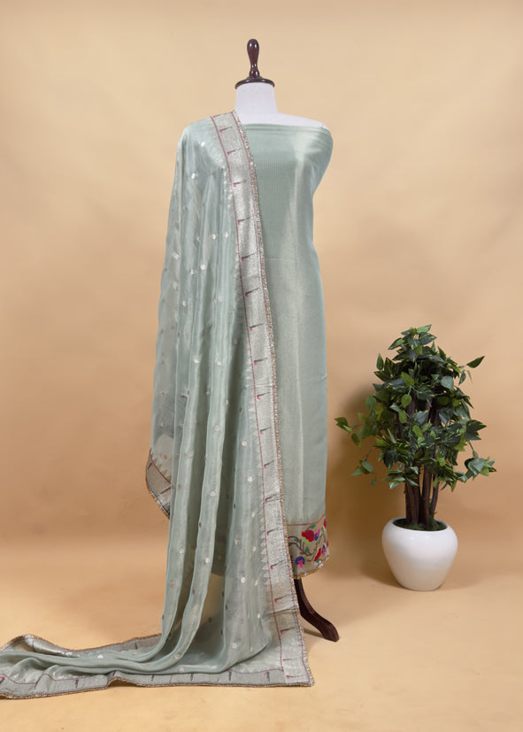 Luxe Basil Green Handloom Self Tissue Silk Suit Fabric With Paithani Weaving And Jhalar Gota Laces