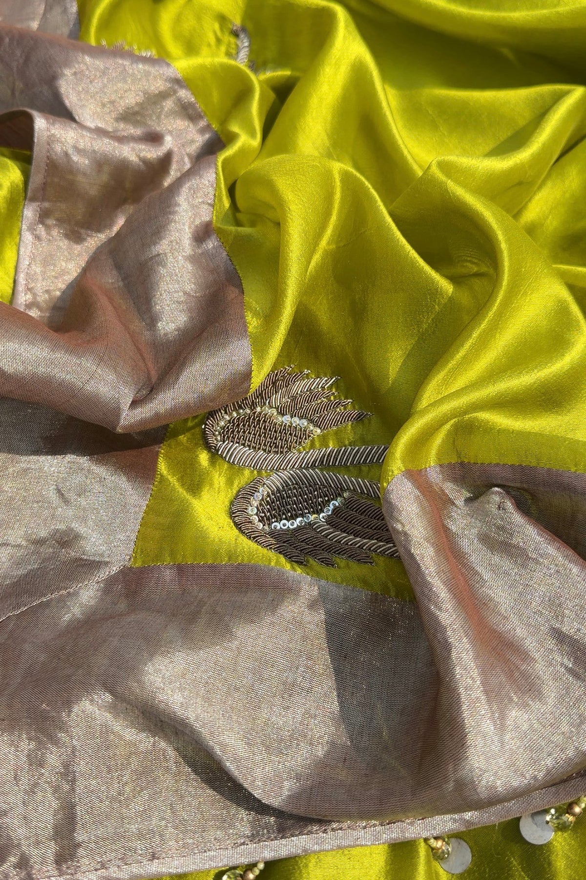 Pear Green Pura silk saree in dabka handwork with tissue blouse