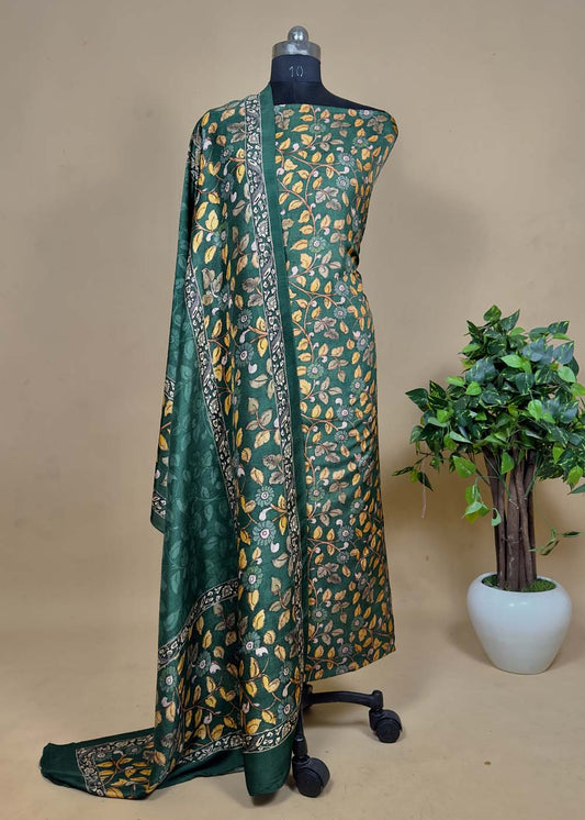 Green color Printed silk suit with dupatta.