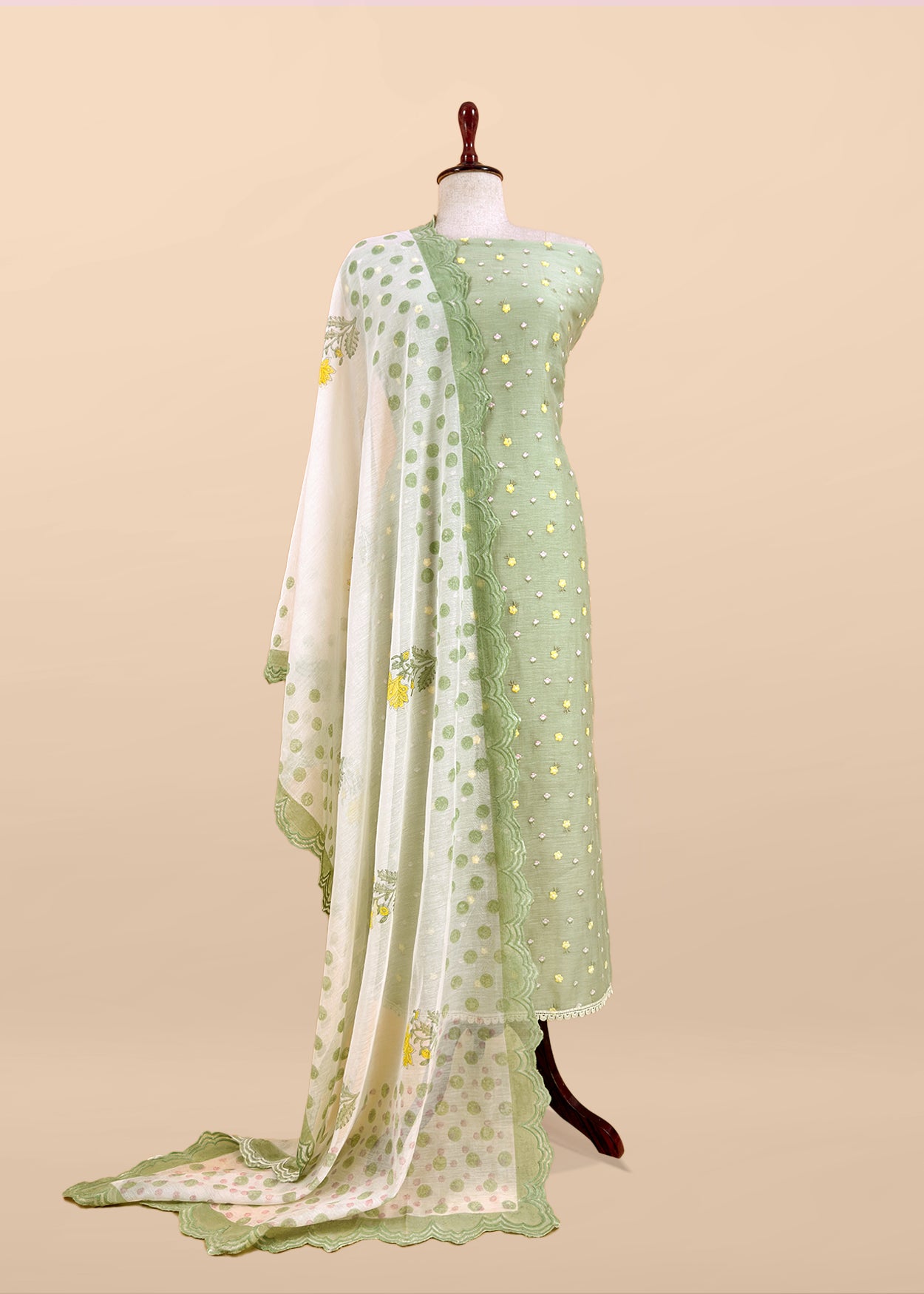 Green Embroidered Unstitched Mulmul Suit With Scalloped Border.