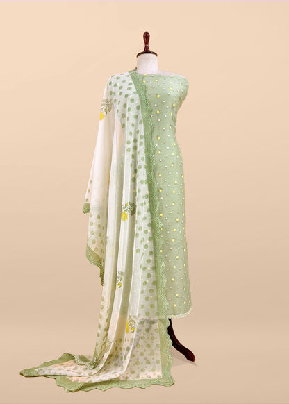 Green Embroidered Unstitched Mulmul Suit With Scalloped Border.
