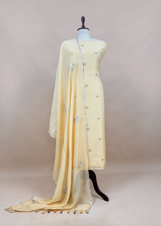 Light Yellow Mulmul Suit And Dupatta In Dori Work