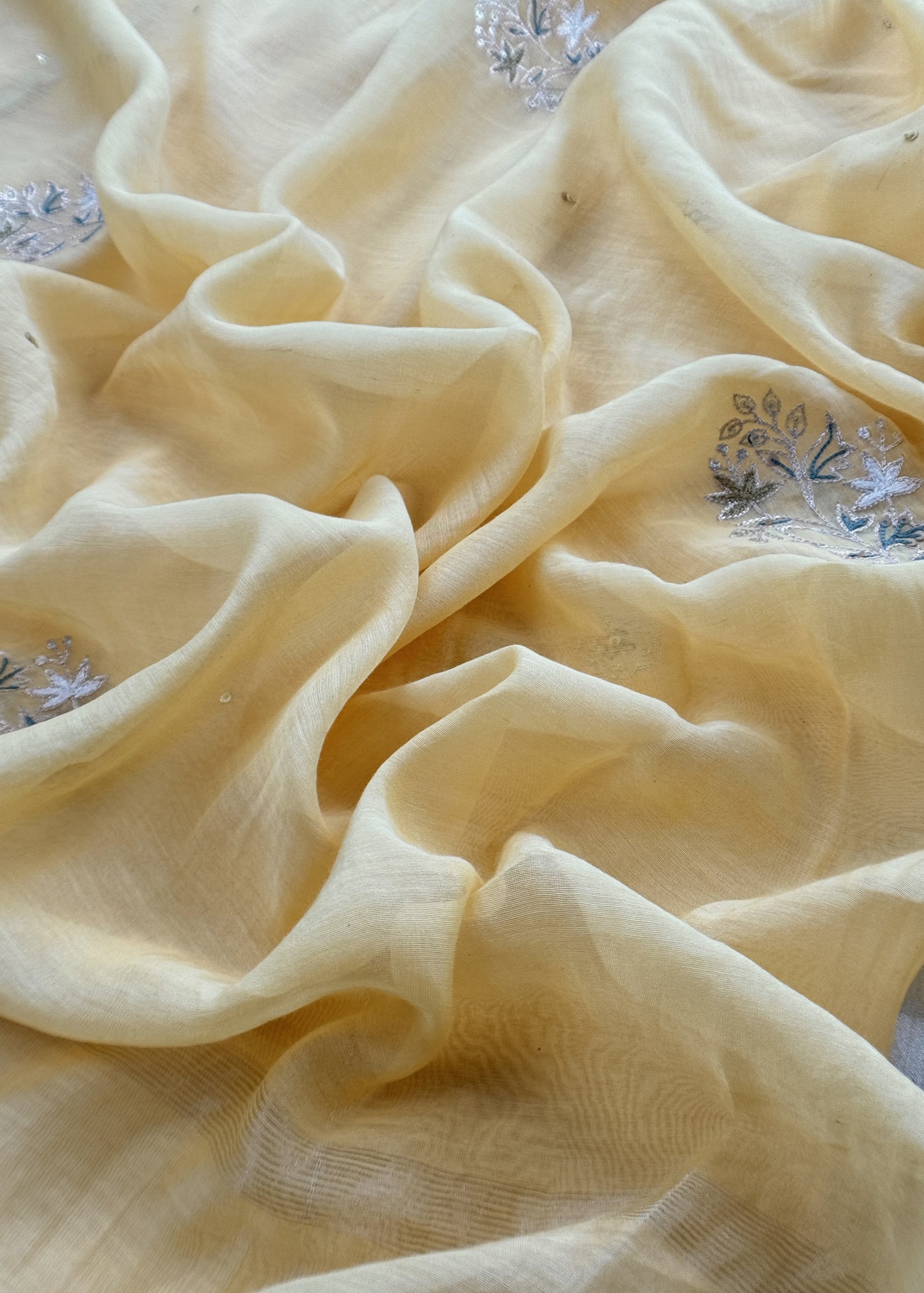 Light Yellow Mulmul Suit And Dupatta In Dori Work