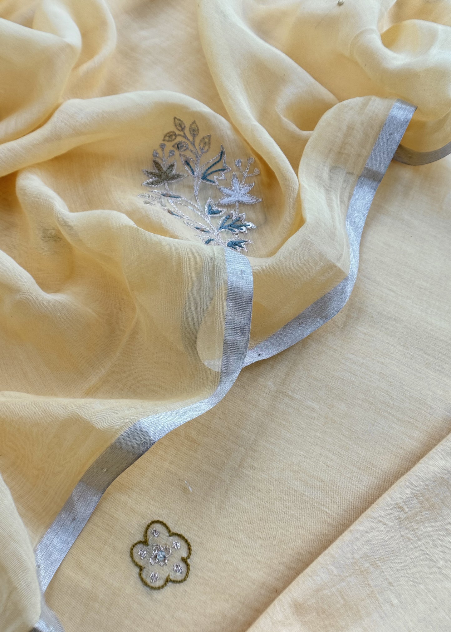 Light Yellow Mulmul Suit And Dupatta In Dori Work