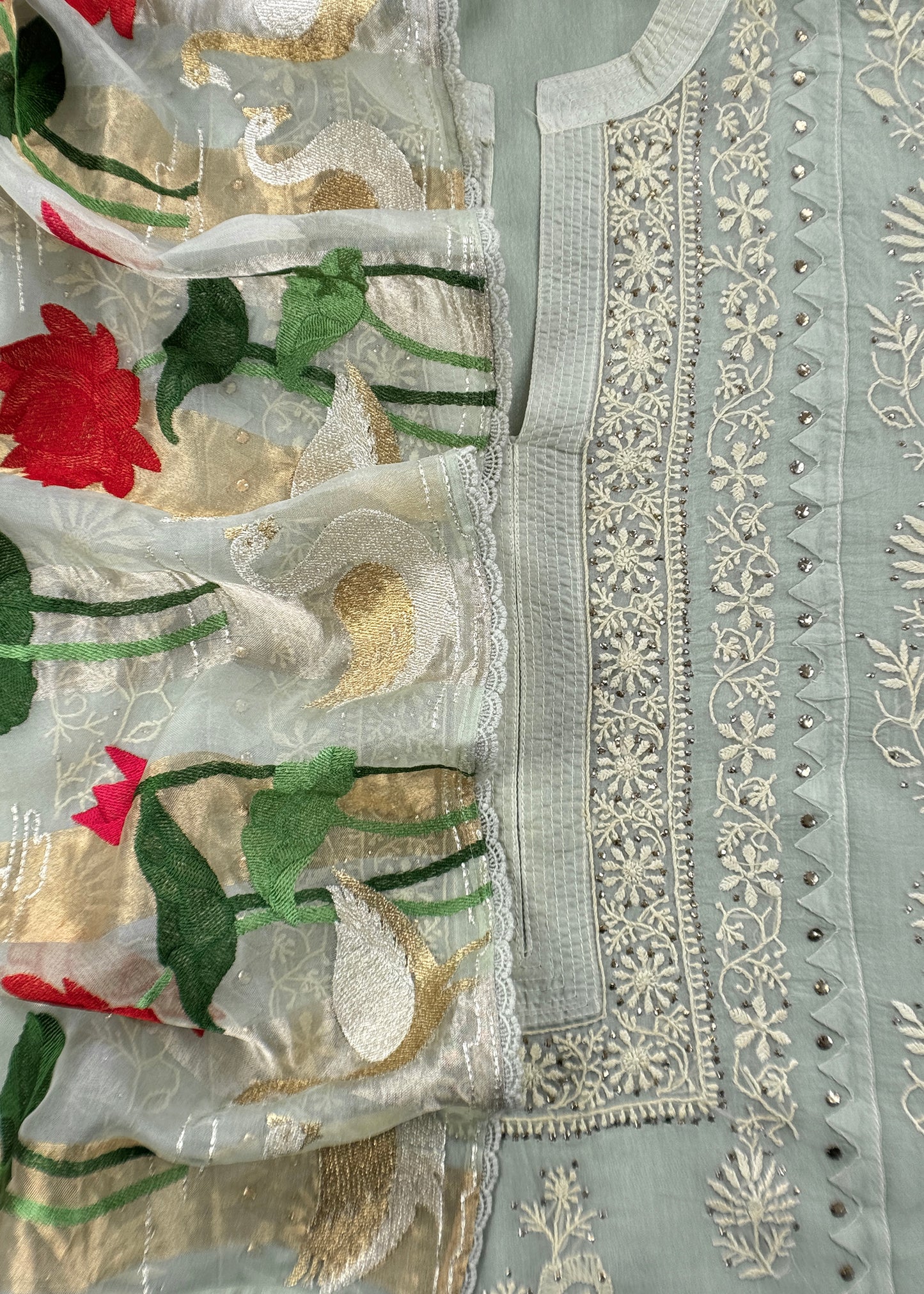 Naaz soft blue Pure Organza hand embroidered Lakhnavi kurta and Kora silk dupatta with swan resham embroidery