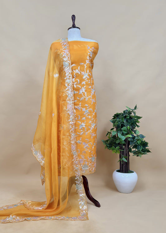 Yellow Handloom Organza Suit Set With Floral Appliqué And Pitta Handwork