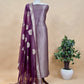 PurpleThe wedding wear three-piece suit has brocade kurta and organza Dupatta