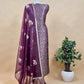 PurpleThe wedding wear three-piece suit has brocade kurta and organza Dupatta