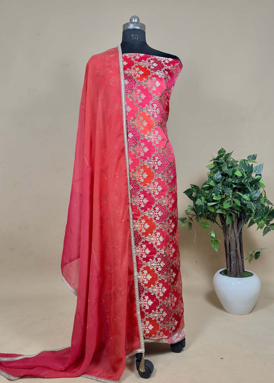 Red Banarasi Suit Embellished With Oragnza Dupatta