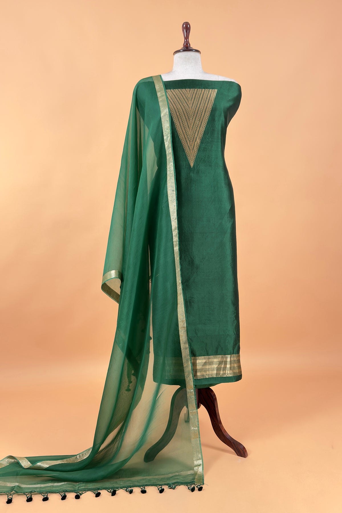 Only dry cleaning is recommended for this fabric to maintain its vibrant colors and ensure gentle care, preventing shrinkage or fading. Treat your Kalasheel dupatta suit with love and pass it on as a cherished family heirloom.