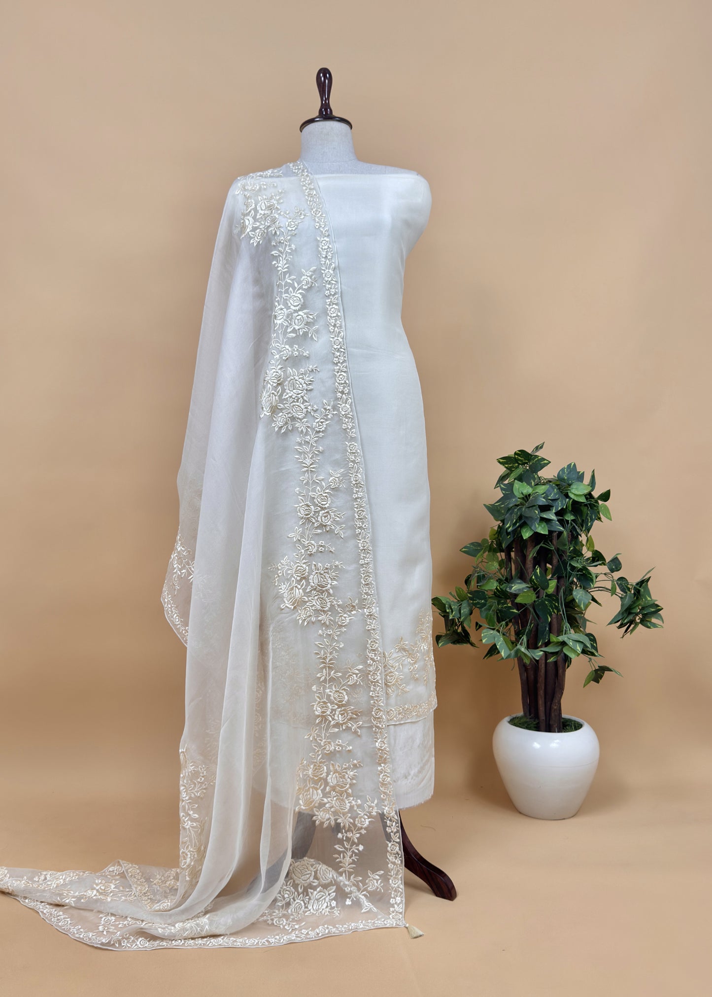 White Handwoven Puer Organza Suit With Resham Embroidery Work