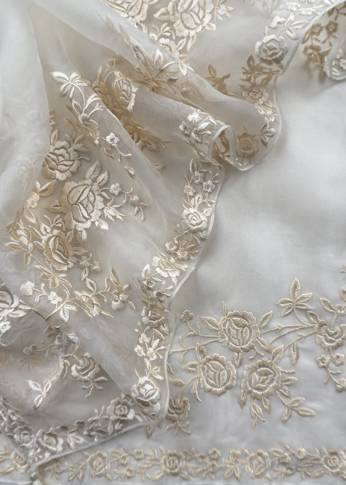 White Handwoven Puer Organza Suit With Resham Embroidery Work