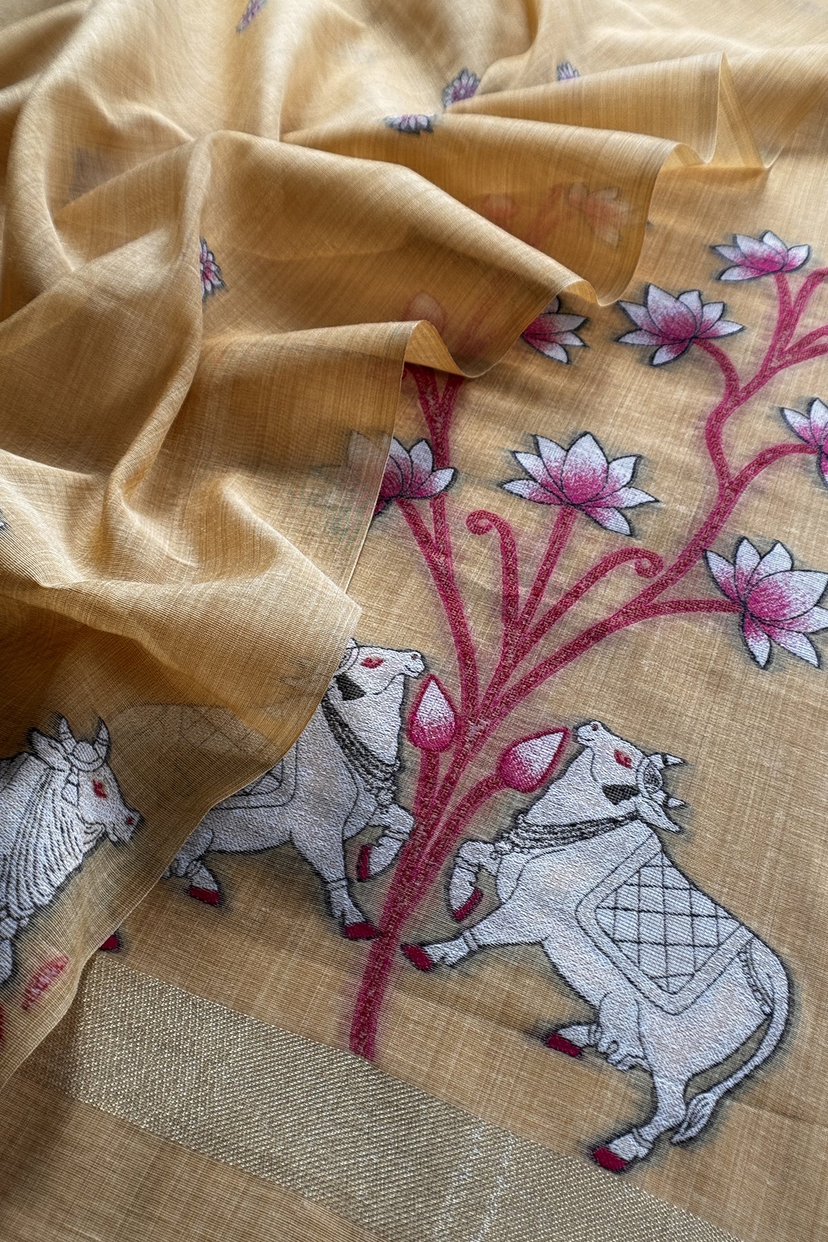 linen chanderi suit with jamdani parrot weaving

