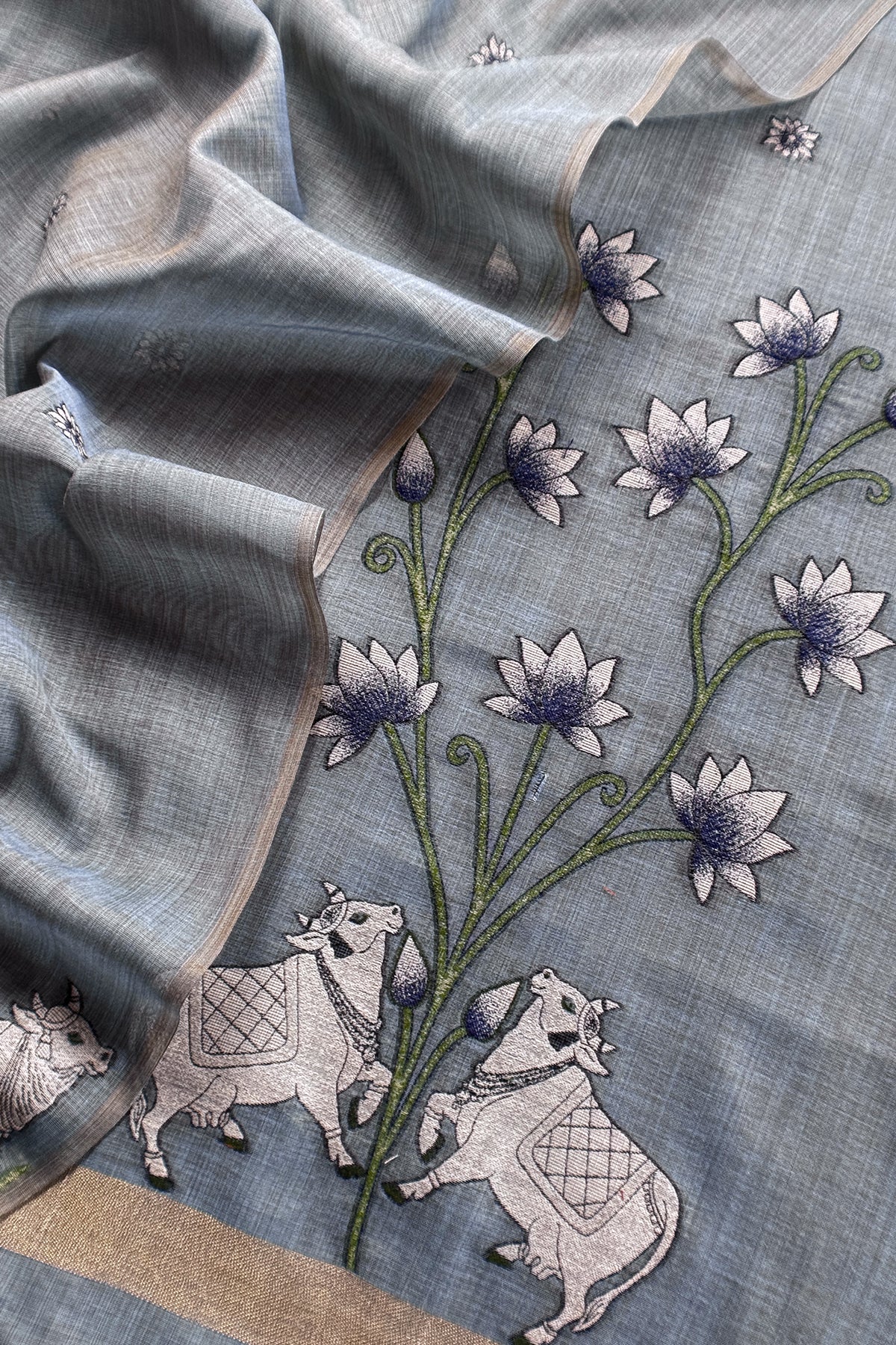 linen chanderi suit with jamdani parrot weaving

