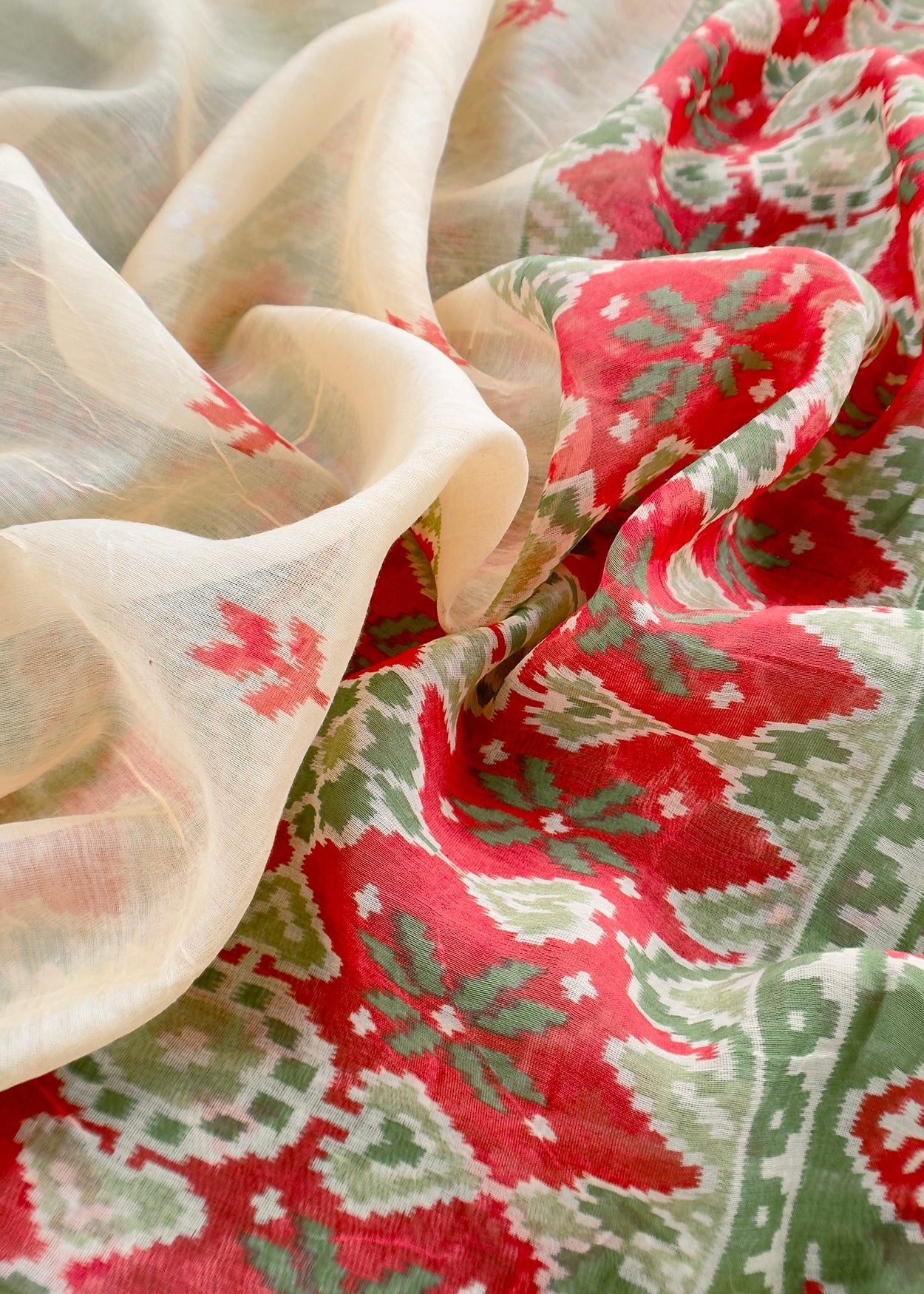 Green With Red Handloom Patola Unstitched Suit In Mulmul