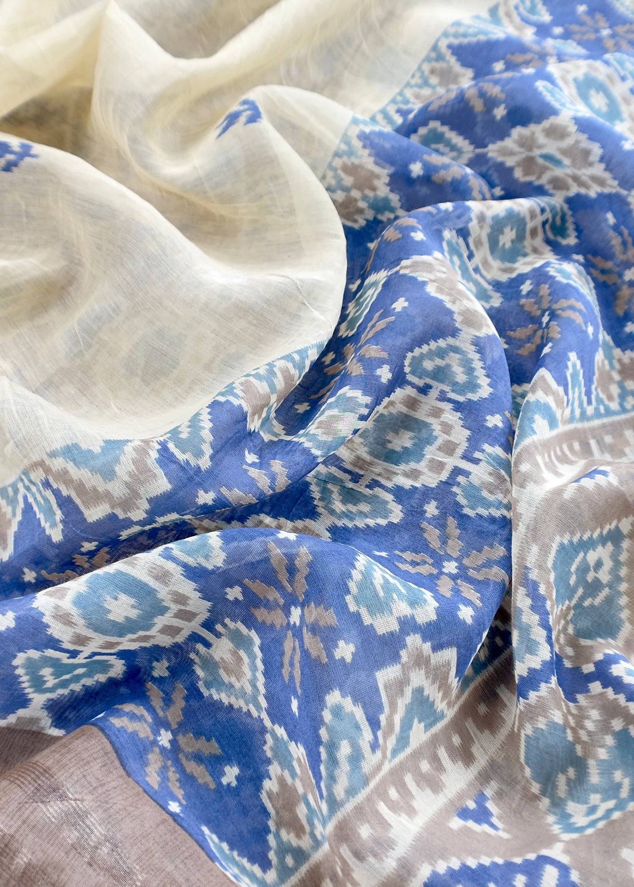 Soft Brown With Blue Handloom Patola Unstitched Suit In Mulmul