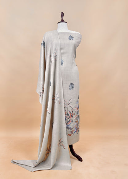 Turquoise Unstitched Woolen Suit With Aari Embroidery Work