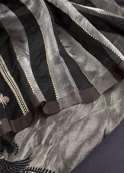Luxe silver Handloom Tissue Silk Kurta And Kora Silk Dupatta With Kadwa Weaving