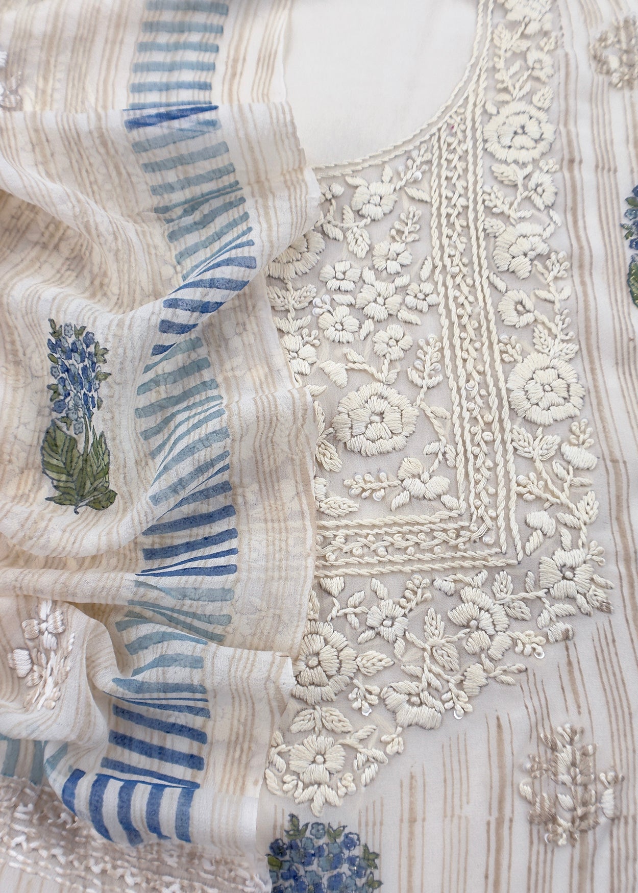 White With Blue Handloom Georgette Suit With Thread Embroidery