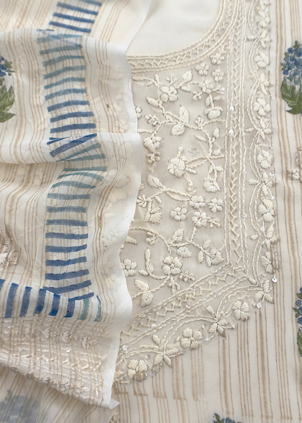 White With Blue Handloom Georgette Suit With Thread Embroidery