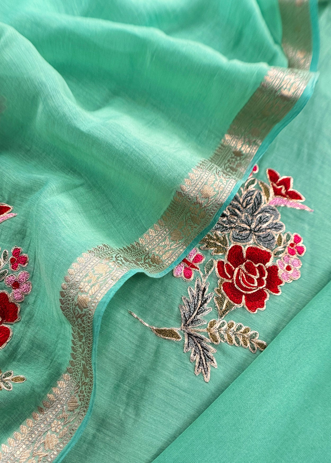 Mulmul suit set with appliqué work with pitta hand detailing

