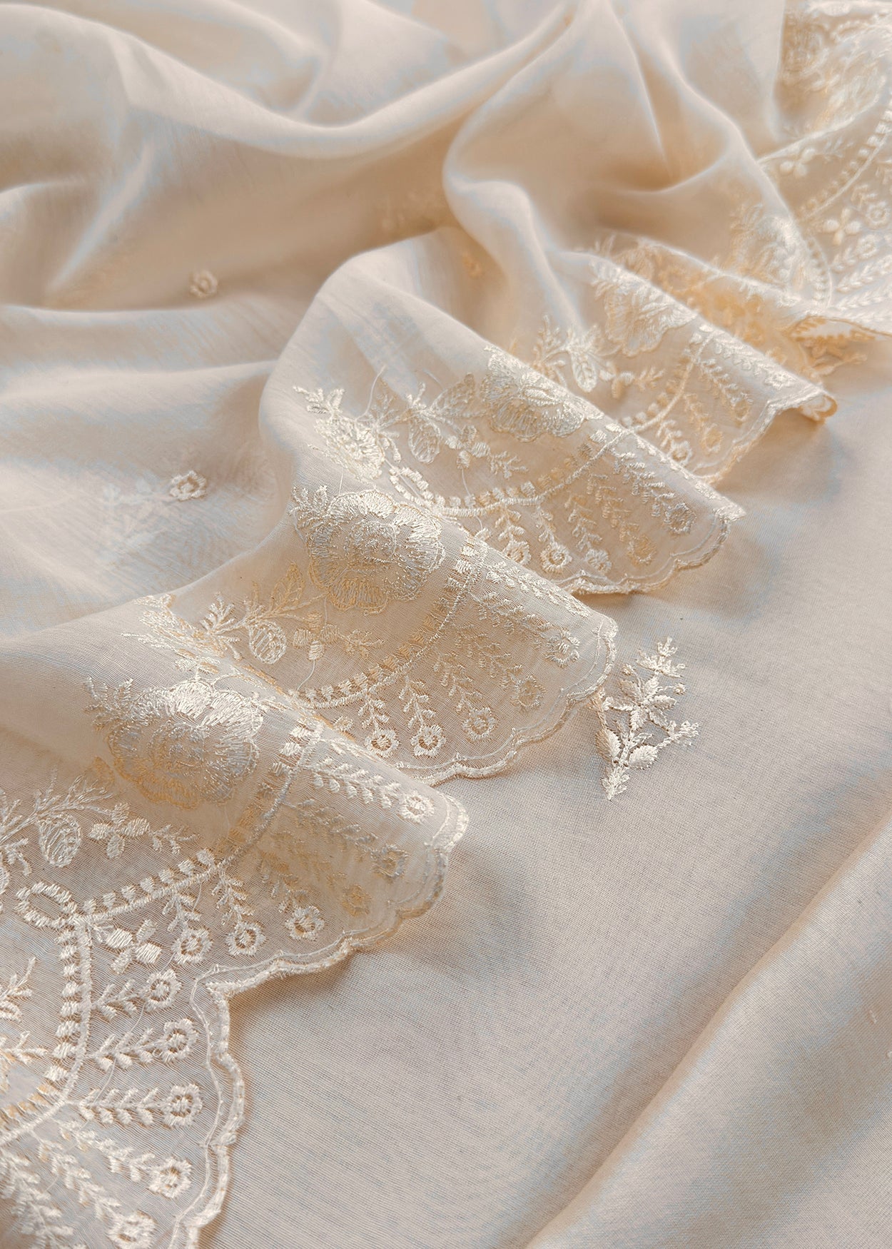 Off White Embroidered Unstitched Mulmul Suit With Scalloped Border