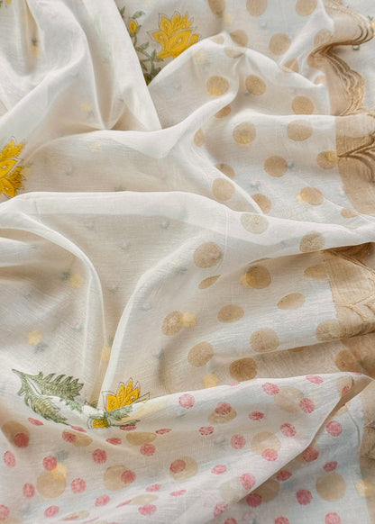 White With Yellow Embroidered Unstitched Mulmul Suit With Scalloped Border.