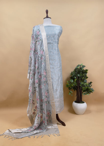 Luxe Powder Blue Handloom Tissue Silk Suit Adorned With Gold Pitta Work And Resham Embroidery