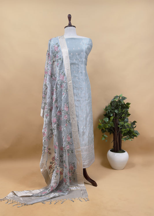 Luxe Powder Blue Handloom Tissue Silk Suit Adorned With Gold Pitta Work And Resham Embroidery