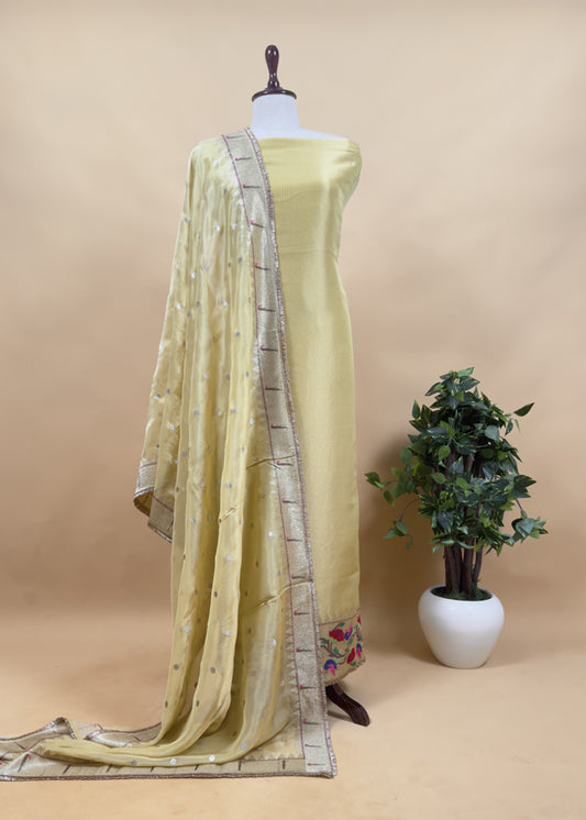 Luxe Basil Green Handloom Self Tissue Silk Suit Fabric With Paithani Weaving And Jhalar Gota Laces