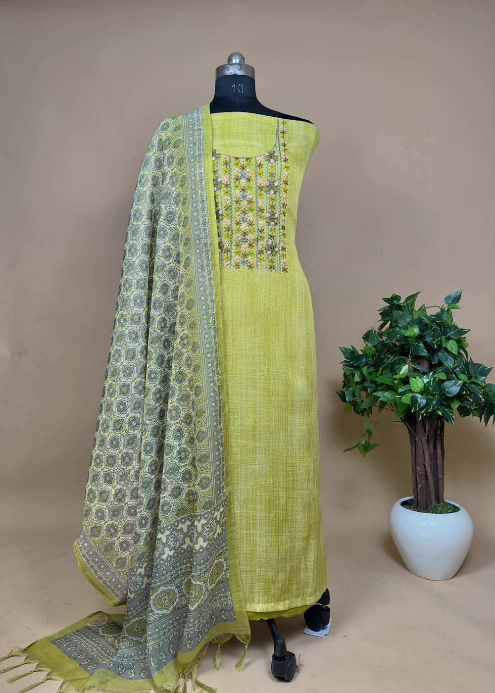 Green Linen Chanderi Suit with french knot embroidery