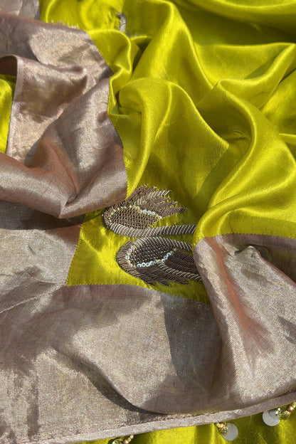 Pear Green Pura silk saree in dabka handwork with tissue blouse